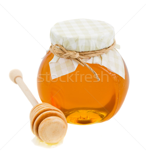 honey in glass pot and stick Stock photo © neirfy