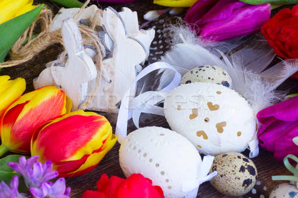 Spring flowers with easter eggs Stock photo © neirfy