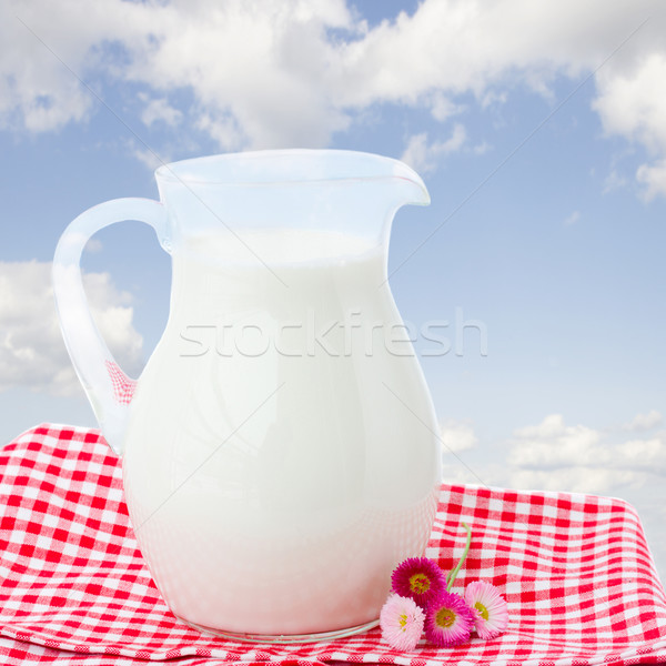 glass pitcher full of milk Stock photo © neirfy