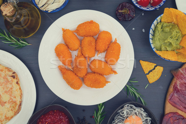 Table with spanish tapas Stock photo © neirfy