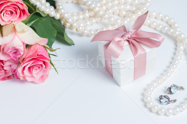 Box with pink ribbon Stock photo © neirfy