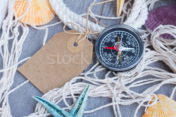 compass on fishing net with tag Stock photo © neirfy