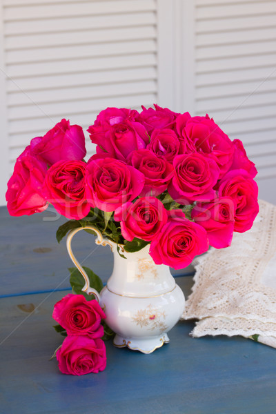 Mauve roses in vase Stock photo © neirfy