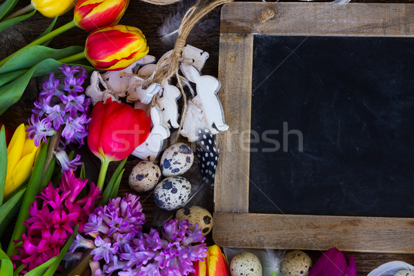 Spring flowers with easter eggs Stock photo © neirfy