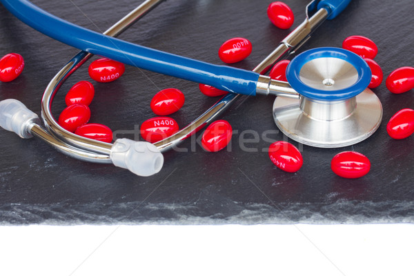stethoscope with red  pills Stock photo © neirfy