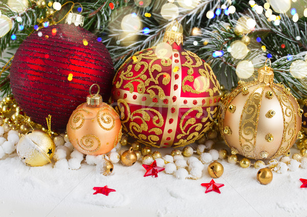 Stock photo: golden christmas bow and evegreen tree 