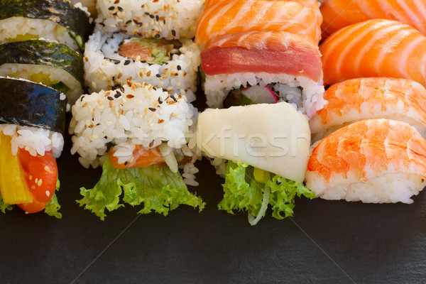 Almuerzo sushi plato rodar frontera negro Foto stock © neirfy