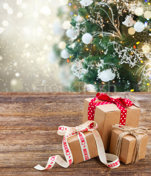 Hecho a mano cajas de regalo tres mesa de madera Navidad decorado Foto stock © neirfy