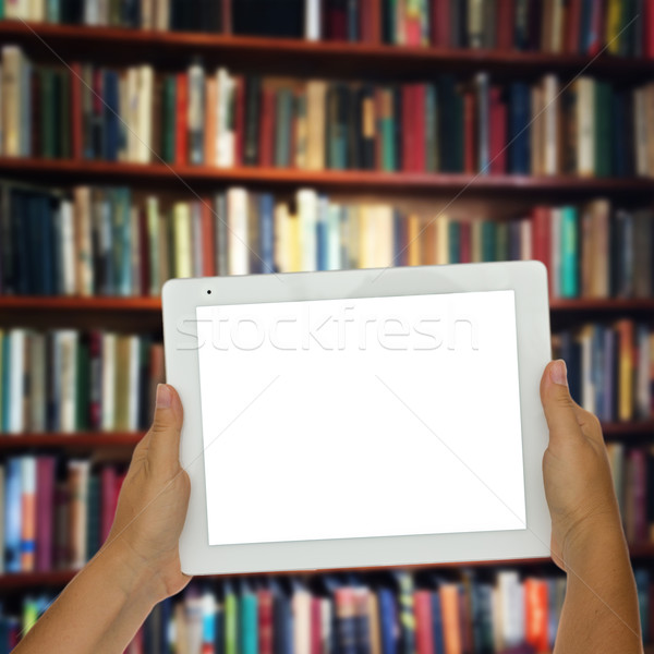  empty tablet with library shelfs in background Stock photo © neirfy