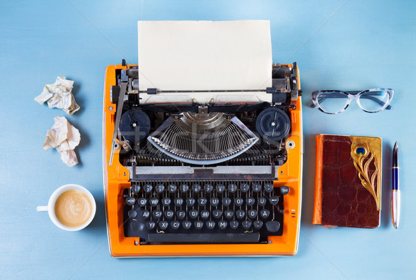 Workspace with vintage orange typewriter Stock photo © neirfy