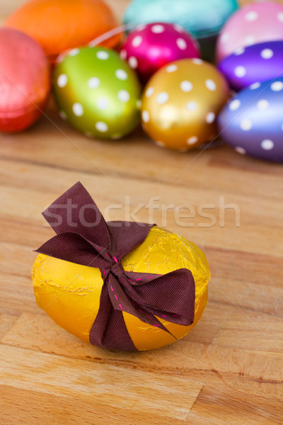 golden easter egg on wooden table Stock photo © neirfy
