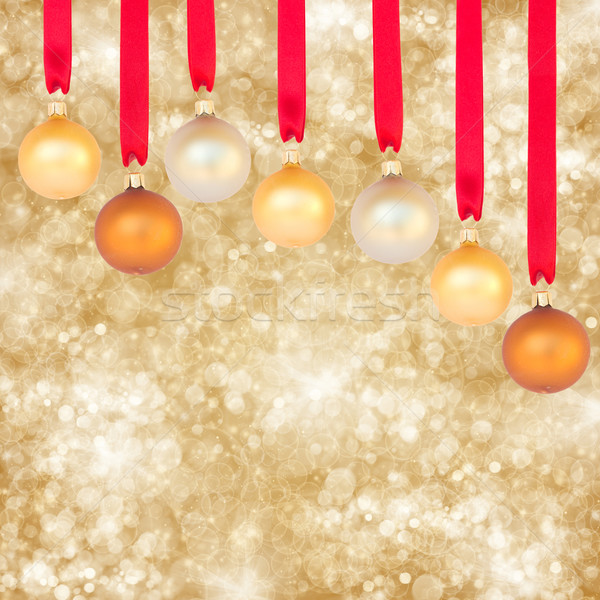 chrismas balls on golden background Stock photo © neirfy