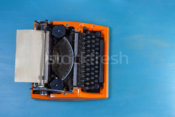 Workspace with vintage orange typewriter Stock photo © neirfy