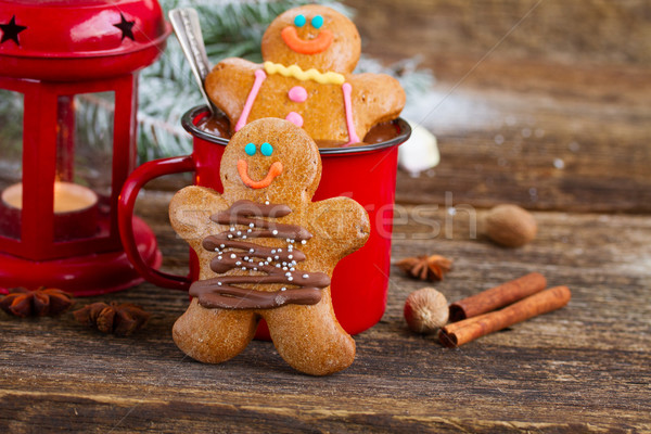 Gingerbread men with mug of hot chocolate Stock photo © neirfy