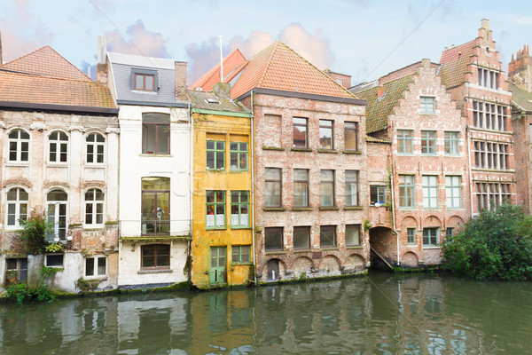 Historic Buildings With Canal In Ghent Stock photo © neirfy