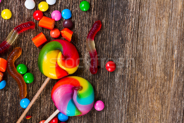 Colorful candies on wood Stock photo © neirfy