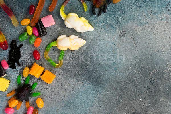 Colorful halloween candies on stone Stock photo © neirfy