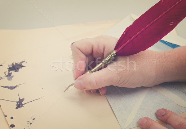 Hand halten Feder Stift rot alten Stock foto © neirfy