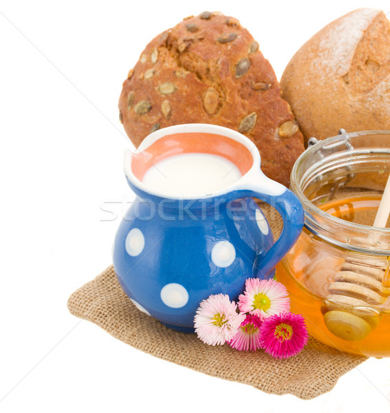 milk with bread and honey Stock photo © neirfy