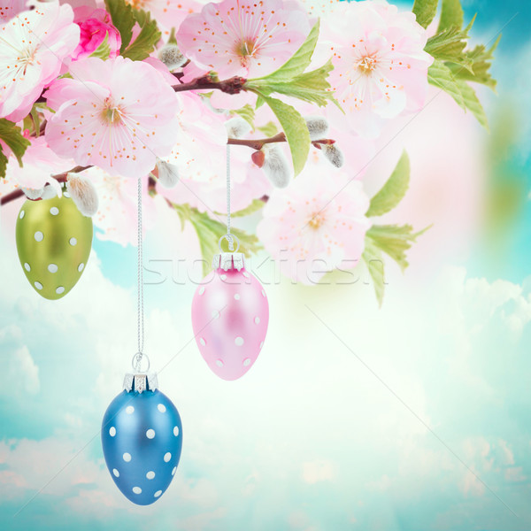 Colorful hanging easter eggs Stock photo © neirfy