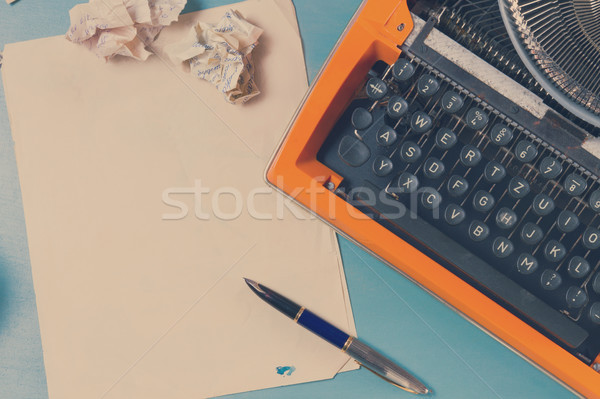 Workspace with vintage orange typewriter Stock photo © neirfy