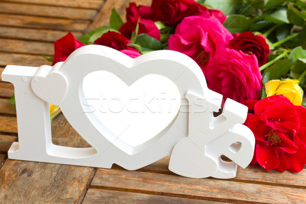 love sign with roses Stock photo © neirfy