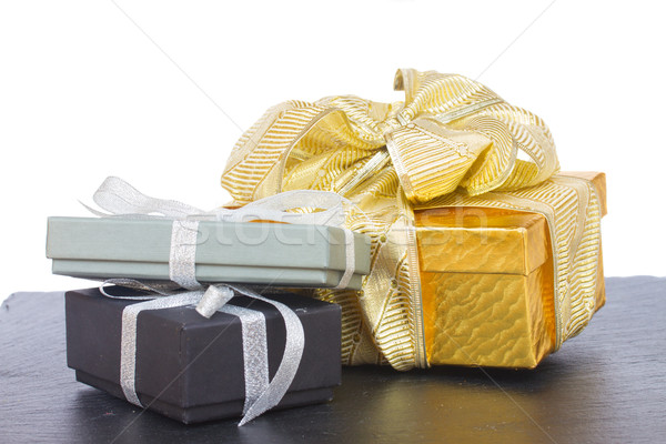 Stock photo: pile of  gift boxes with christmas decorations