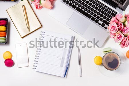 Nőies munkaterület felső kilátás üres notebook Stock fotó © neirfy