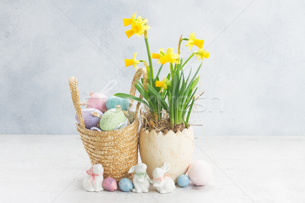 Húsvéti tojások vadászat fehér nyulak kosár tojások Stock fotó © neirfy
