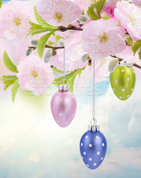 Colorful hanging easter eggs Stock photo © neirfy