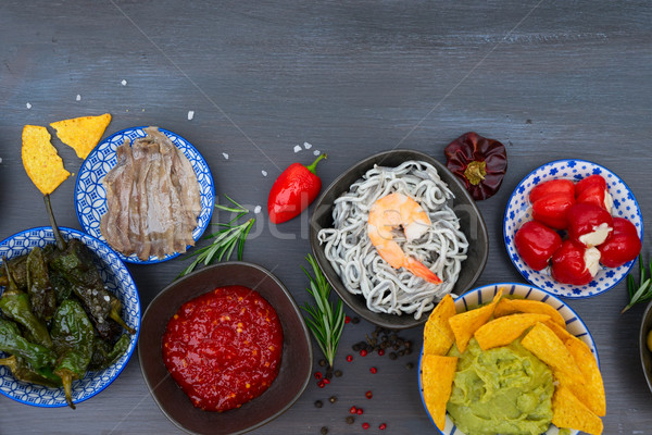 Table with spanish tapas Stock photo © neirfy