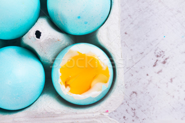 Ayarlamak mavi paskalya yumurtası bir yumurta sarısı üst Stok fotoğraf © neirfy