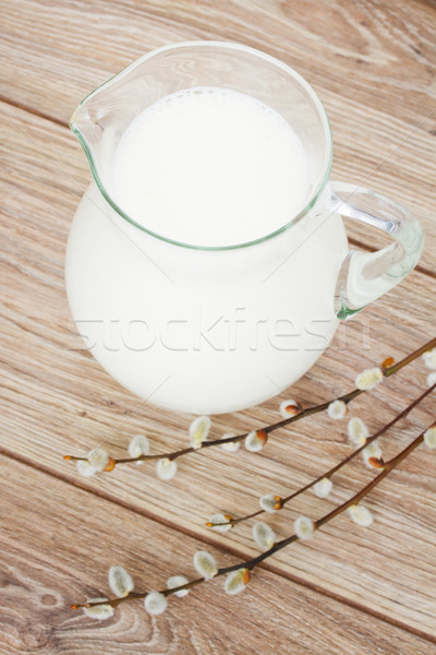 milk on wooden table Stock photo © neirfy