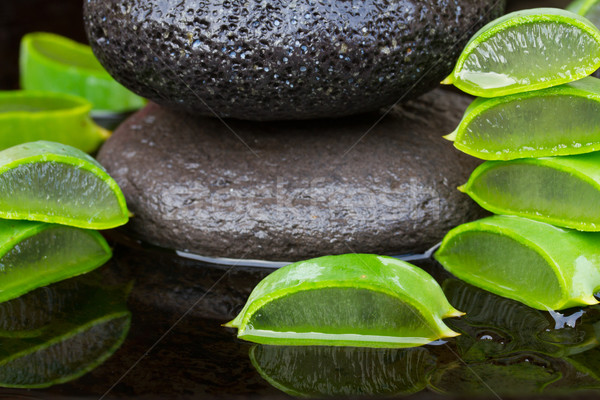 Aloesu spa mokro czarny masażu kamienie Zdjęcia stock © neirfy