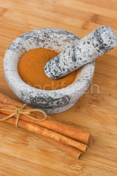 cinnamon powdered in mortar Stock photo © neirfy