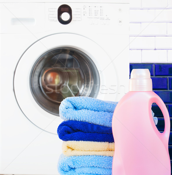 Towels with detergent and washing machine Stock photo © neirfy