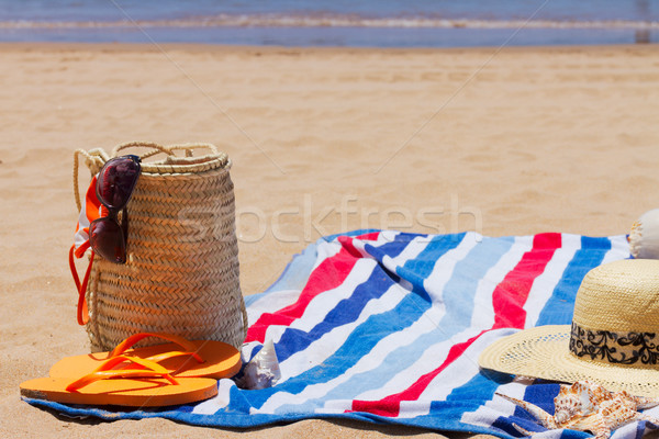 Сток-фото: полотенце · солнечные · ванны · пляжное · полотенце · морем
