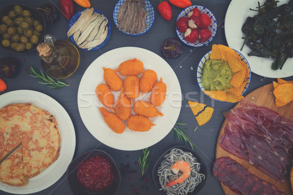 Table with spanish tapas Stock photo © neirfy