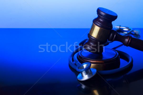 Hand holding law gavel Stock photo © neirfy