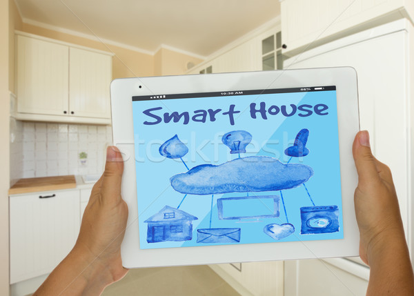 Smart huis handen tablet afstandsbediening Stockfoto © neirfy