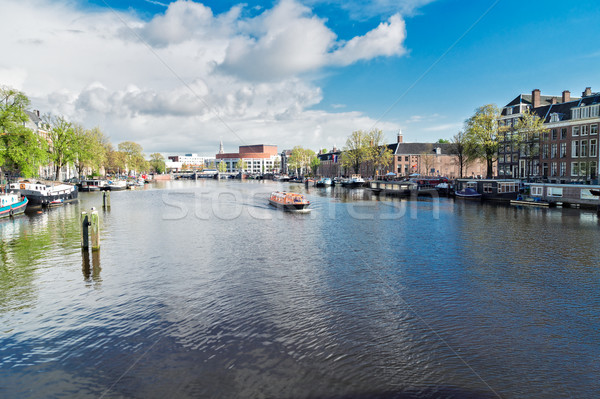 Kanał Amsterdam tradycyjny domów Niderlandy niebo Zdjęcia stock © neirfy