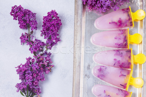 Stock photo: Popsicles with lilac flowers