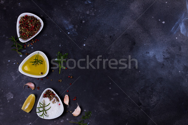 Voedsel specerijen zout olijfolie zwarte achtergrond Stockfoto © neirfy