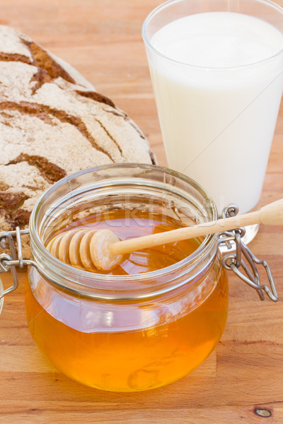 Honing brood melk houten tafel glas tabel Stockfoto © neirfy