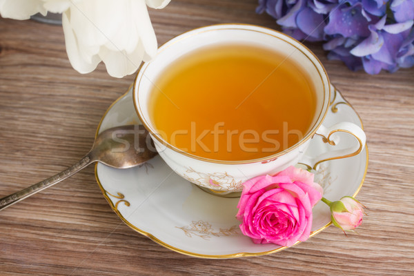Antigo copo chá flores rosa Foto stock © neirfy