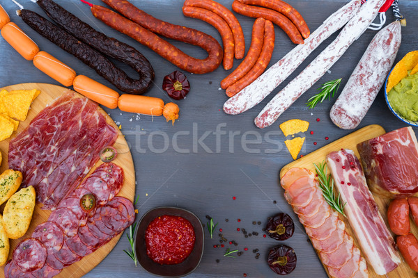 Stock photo: Picnic table with spanish sausage tapas