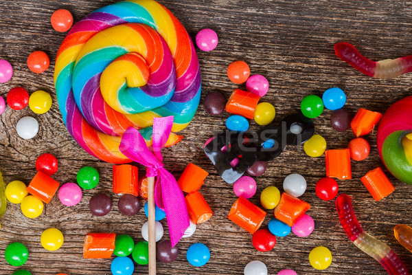 Colorful halloween candies on wood Stock photo © neirfy