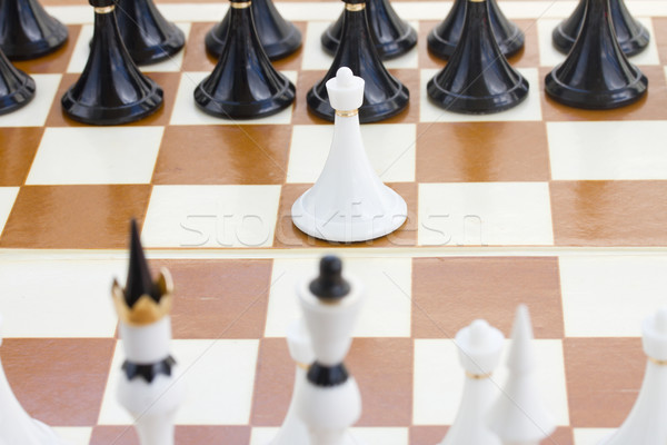 white pawn in front of black chess Stock photo © neirfy