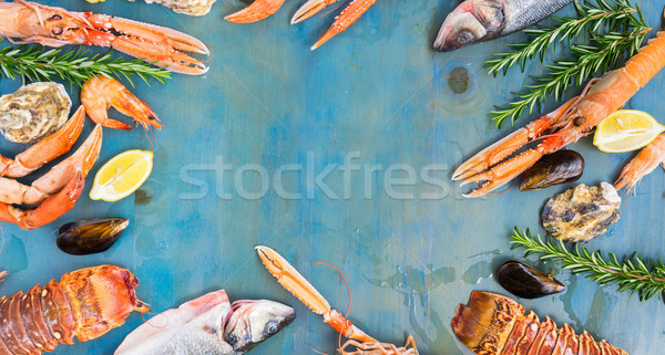 Fresche frutti di mare blu pesce frame legno Foto d'archivio © neirfy