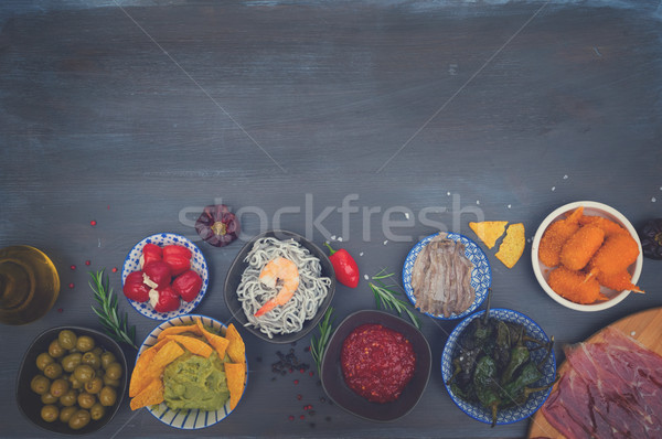 Table with spanish tapas Stock photo © neirfy